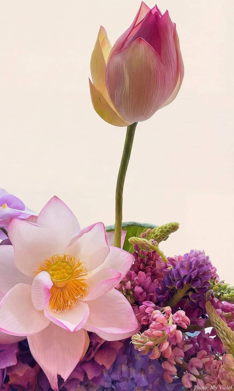 Matching pink (with lilac shade) lotus, mauve and dusty pink flowers floral arrangement, styled to complement our blush, dusty pink and mauve mix and match bridesmaid dresses.