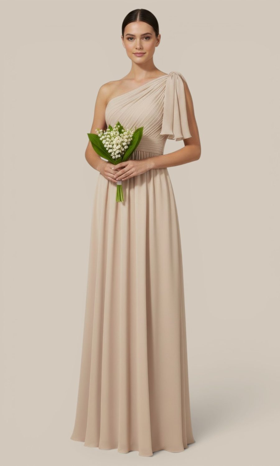 Beige chiffon one-shoulder bridesmaid dress by Natasha Millani, featuring double shoulder panels (they look like slit sleeve) styled with lily of the valley flowers to unify elegantly mismatched wedding palette.