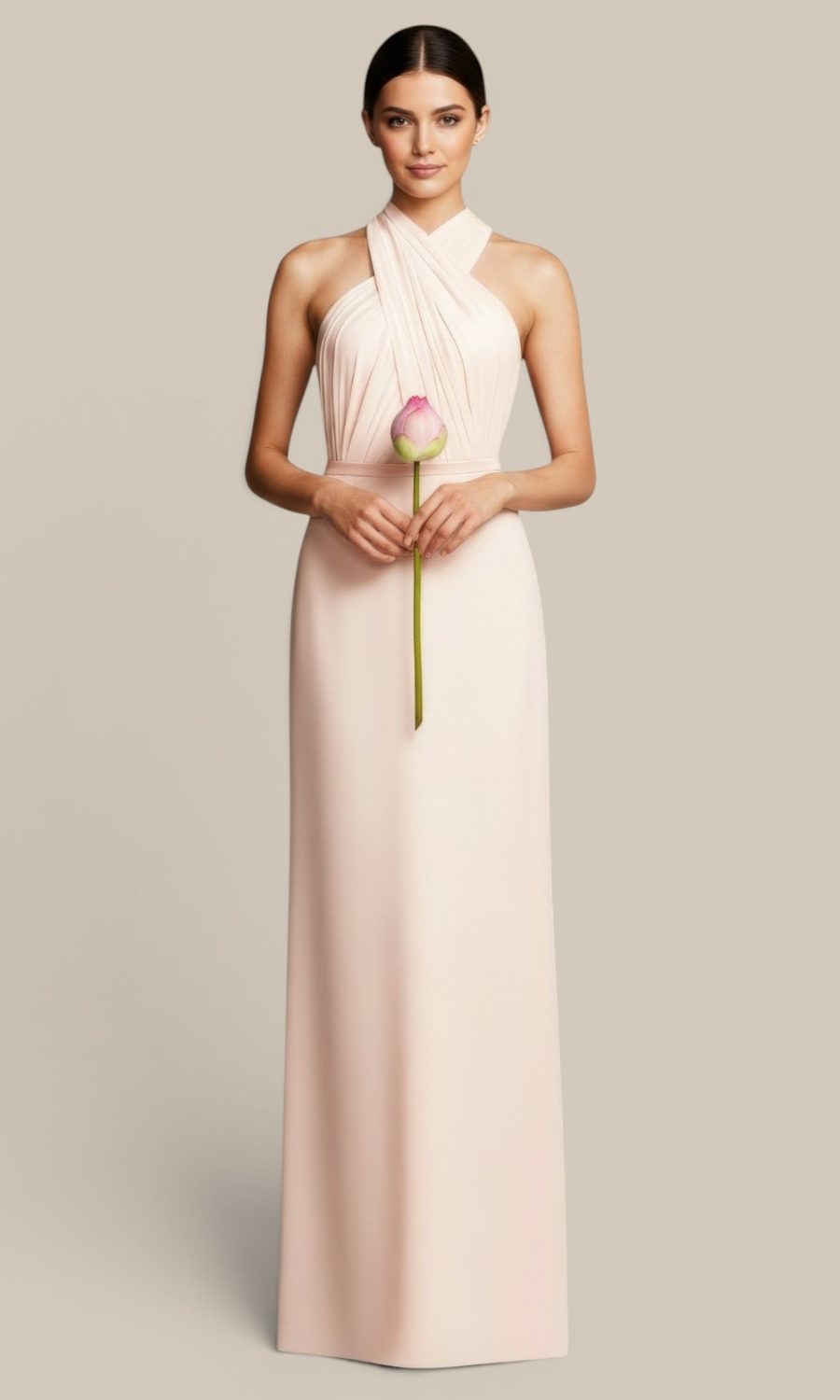Natasha Millani blush pink draped cross halter bridesmaid gown, styled with a matching pink lotus flower for cohesive mismatched wedding palette.