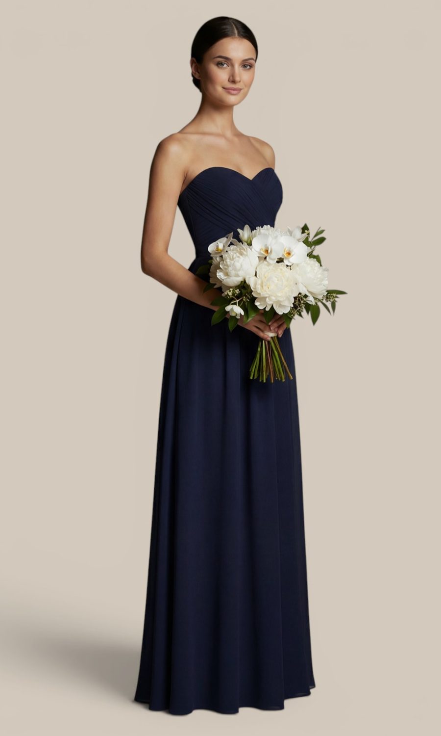 Classic navy blue chiffon bridesmaid dress with removable spaghetti shoulder straps, styled with an elegant bouquet of white peonies and orchids.