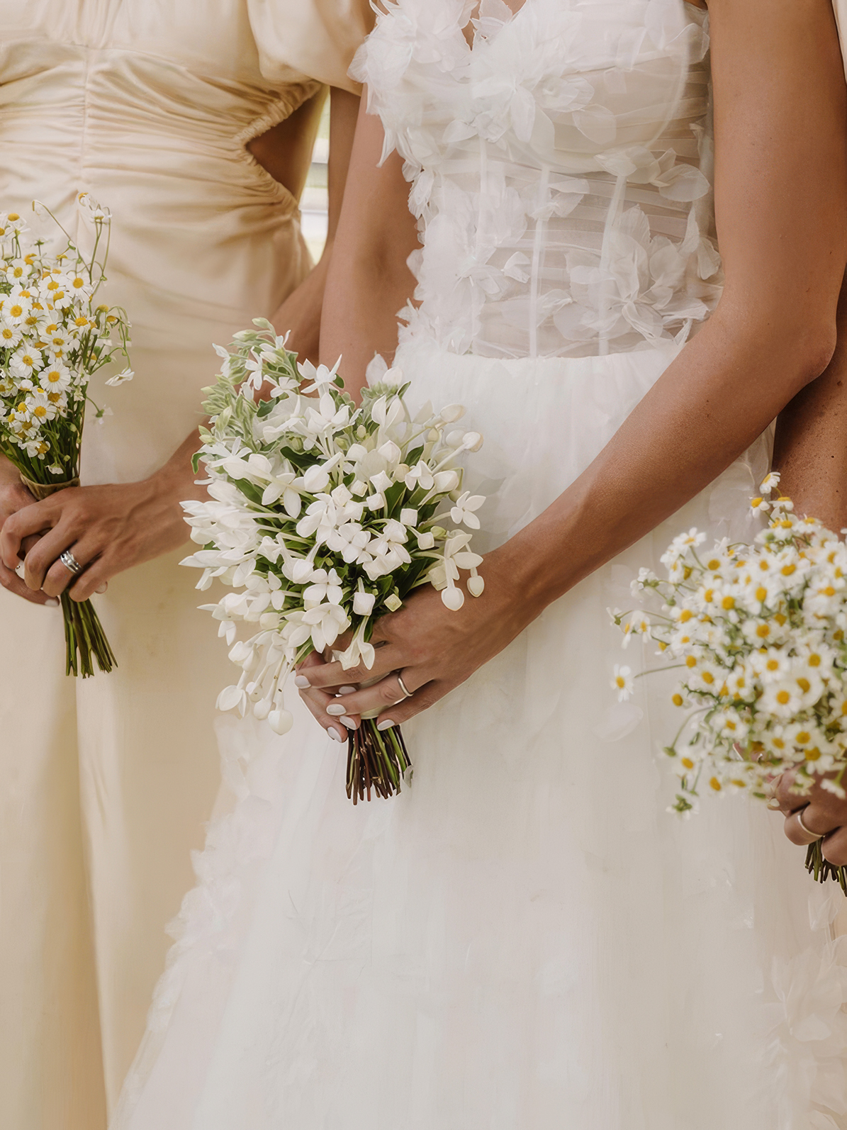 Pretty wedding bouquets curated for pastel mix and match bridesmaid dresses.