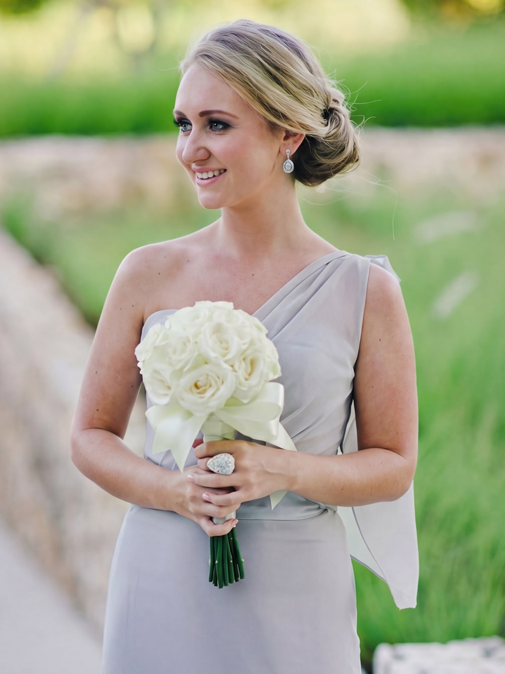 Elegant wedding garden reception flower arrangement for neutral wedding theme.