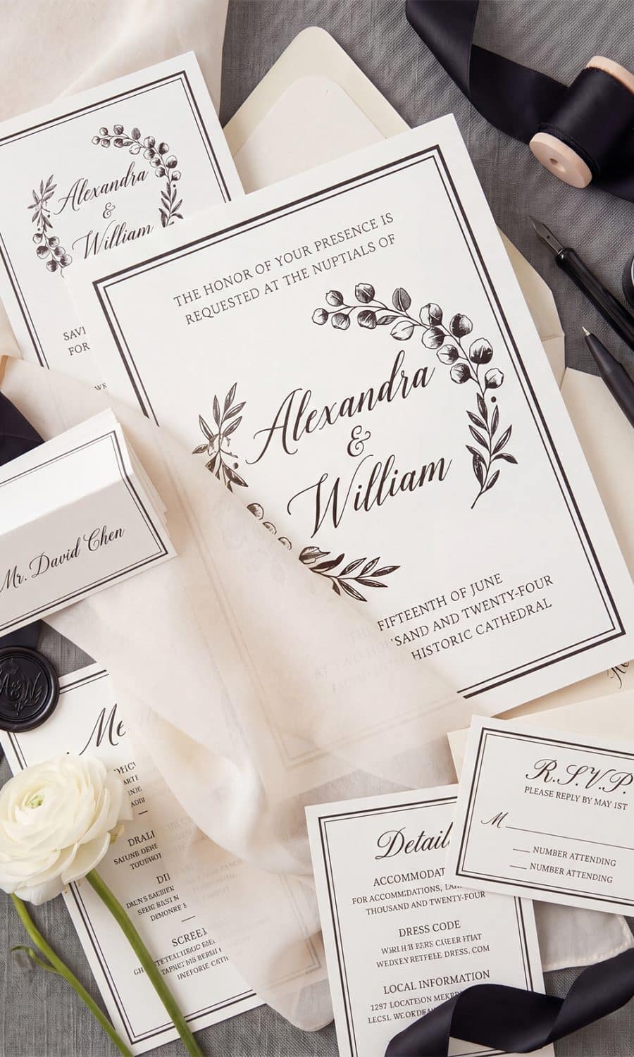 Elegant ivory and black wedding invitation suite illustrating how to seamlessly coordinate a highly tailored, mismatched bridal aesthetic.