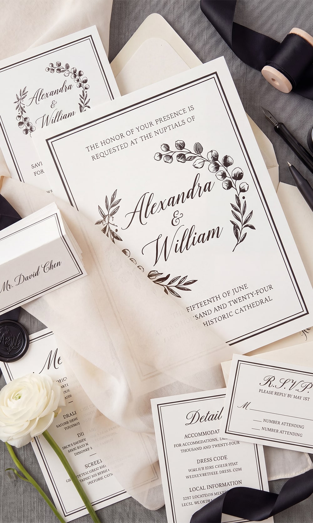 Elegant ivory and black wedding invitation suite illustrating how to seamlessly coordinate a highly tailored, mismatched bridal aesthetic.